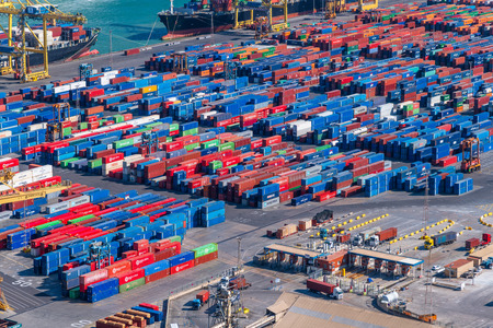 BARCELONA, SPAIN - MAY 11, 2018: Containers in the city port, aerial view. Barcelona is a major...
