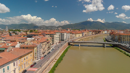 Aerial view of beautiful Lungarni in Pisa. Arno river and medieval buildings, Tuscany.の写真素材