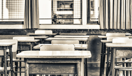 Kid desks in elementary classroom.の写真素材