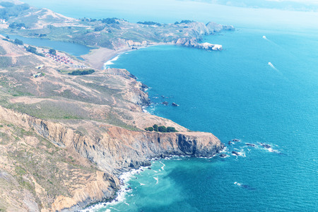 Aerial view of San Francisco city hills from helicopter.