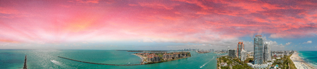 Amazing aerial view of Miami Beach and coastline at sunset, Florida.