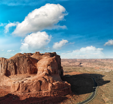 Panoramic sunset aerial view of Arches National Park from helicopter, Utah.