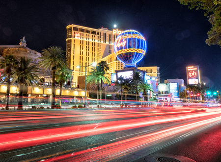 LAS VEGAS, NV - JUNE 30, 2018: Night lights of cars in the Strip. Las Vegas is a famous gambling destination.のeditorial素材