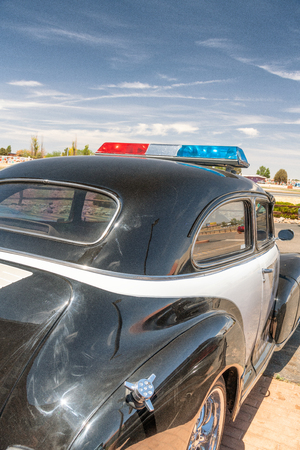 Vintage police car, back and side view.の写真素材