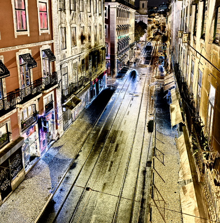 LISBON - OCTOBER 30, 2018: Illuminated street at night, aerial view. Lisbon attracts 3 million tourists annually.のeditorial素材