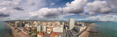 Panoramic aerial view of Follonica, Italy. Coastline of Tuscany with town and ocean.の写真素材