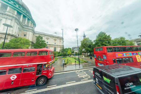 LONDON - JUNE 2015: Traffic in front of St Paul as seen from a bus. London attracts 30 million people annually.のeditorial素材