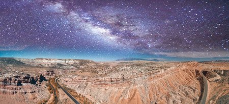 Aerial panoramic view of beautiful canyon on a starry night.の写真素材