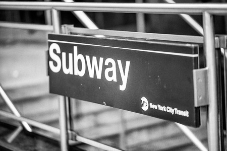 NEW YORK CITY - NOVEMBER 30, 2018: Subway entrance sign. Subway is the fastest way to move across the city.のeditorial素材