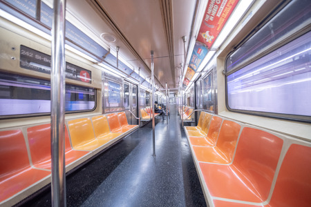 NEW YORK CITY - DECEMBER 2018: Interior of New York City subway train, wide angle view.