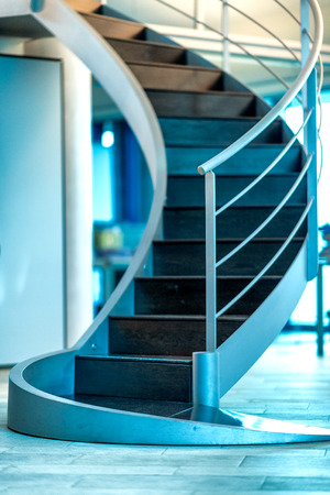 Beautiful modern stairs inside a business ofiice.Modern office chair in business office. Corporate conceptの写真素材