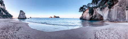 Cathedral Cove panoramic view. Beach and coastline at sunset, Coromandel, New Zealand.