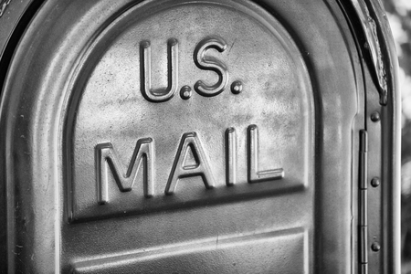 US Mail written on a mailbox.の写真素材