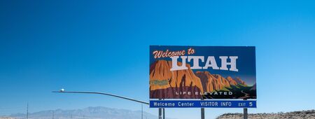 Welcome to Utah road sign along State Route, USA.