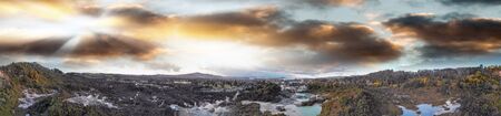 Te Puia National Park in New Zealand. Panoramic aerial view of geysers and lakes at sunset