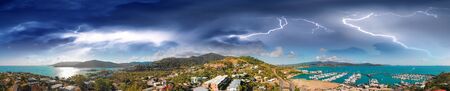 Airlie Beach skyline aerial view during a storm, Queensland coastline.