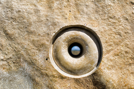 Levigated smooth wall with hole in the middle.