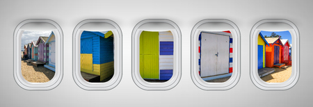 Brighton Beach Huts as seen through five aircraft windows. Holiday and travel concept.の写真素材