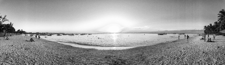 Panoramic view of beautiful beach at sunset.