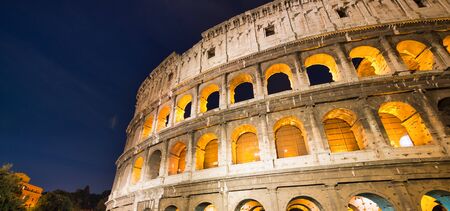 Colosseum at night in Rome, Italy.の写真素材