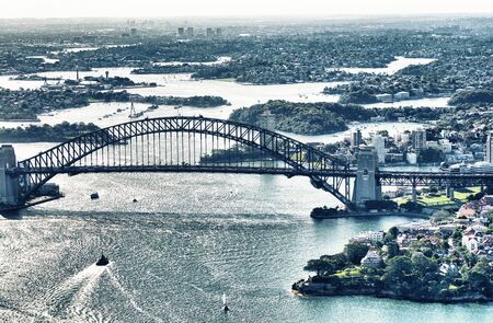 Sydney Harbor Bridge aerial view on a sunny day.の写真素材