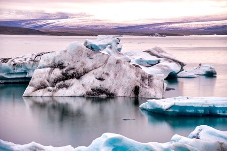Jokulsarlon lake with icebergs at night, Iceland. Long exposure view.の写真素材