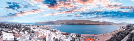 Panoramic aerial view of Akureyri town in Iceland on a sunny summer sunsetの写真素材