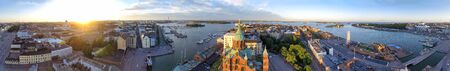 Panoramic sunset aerial view of Helsinki skyline from city port in summer season, Finlandの写真素材