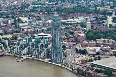 Aerial view of London skyline along River Thames. Vauxhall district.