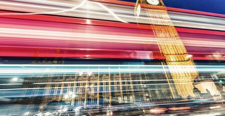 Beautiful bus light trails under Big Ben, London.