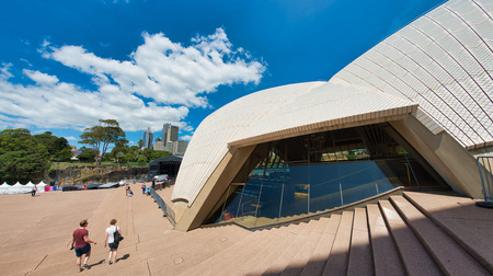 SYDNEY - OCTOBER 2015: Panoramic view of Sydney Opera House on a sunny day. The city attracts 20 million people annually.のeditorial素材