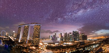 Aerial view of Singapore on a starry night. Marina Bay and Downtown.のeditorial素材