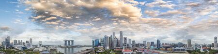 Singapore skyline. Panoramic view from drone at sunset. Buildings and skyscrapers