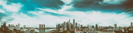 Singapore skyline. Panoramic view from drone at sunset. Buildings and skyscrapers
