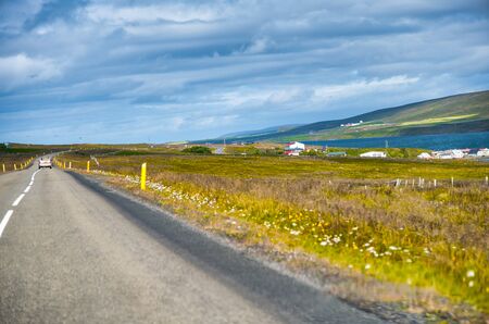 Beautiful landscape scenario with dramatic sky along the ring road, route 1 in Iceland, Europeの写真素材