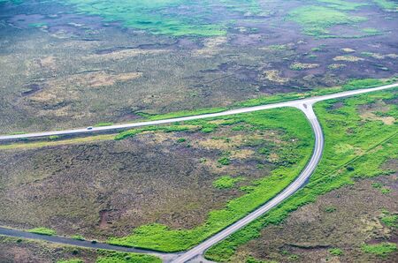 Aerial view of Iceland countryside and road.