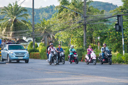 PHUKET, THAILAND - DECEMBER 19, 2019: Island roads with traffic on a sunny day. Phuket is a major destination for younger people.のeditorial素材