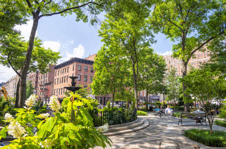NEW YORK CITY - JUNE 2013: Tourists and locals enjoy Jackson Square in summer season, Manhattan.のeditorial素材