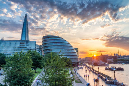 LONDON - JULY 4, 2015: Modern buildings in the southern side of river Thames at sunsetのeditorial素材