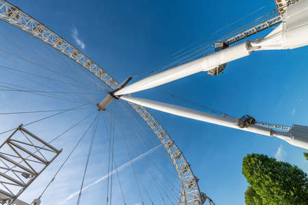 Ferris Wheel wide angle view against blue skyのeditorial素材