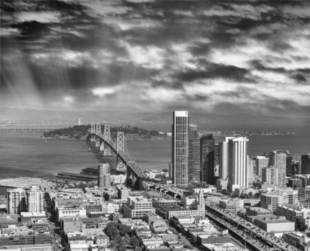 Aerial view of San Francisco main road and Bay Bridge with city skyline.の写真素材