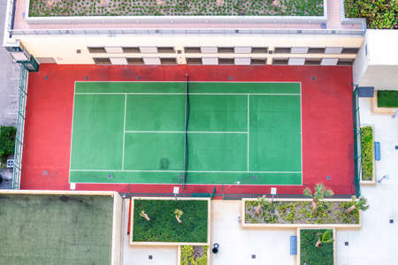 Downward aerial view of tennis court.の写真素材