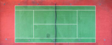 Downward aerial view of tennis court.の写真素材