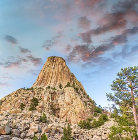 Sunset view of Devil's Tower and surrounding natural landscape, Wyomingの写真素材
