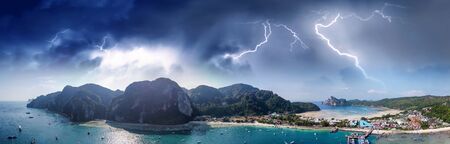 Panoramic aerial view of Tonsai Pier and Phi Phi Don coastline at sunset, Thailand.の写真素材