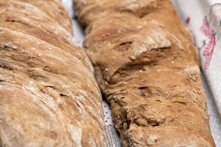 Freshly prepared bread on the table at home.の写真素材