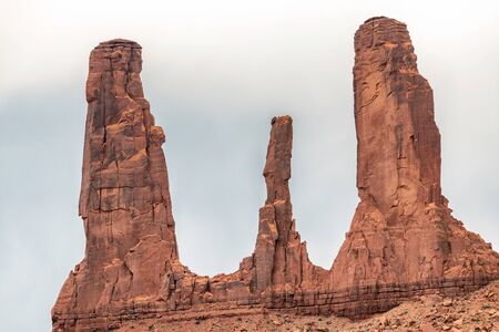 The Three Sisters rock formation, Monument Valley Navajo Tribal Park, USA.の写真素材