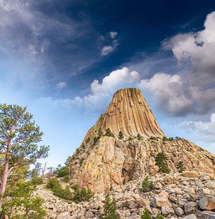 Sunset view of Devil's Tower and surrounding natural landscape, Wyomingの写真素材