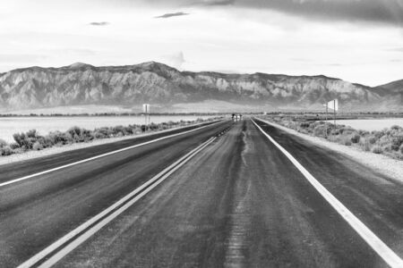 Infinite road to national park straight ahead.の写真素材