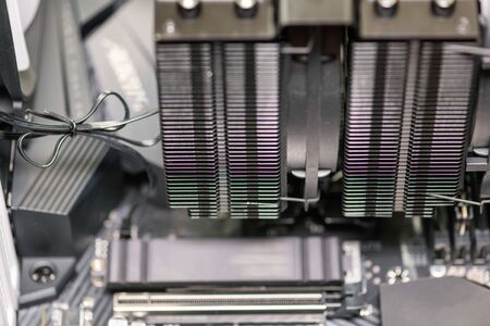 PC Processor heat sink or computer processor cooler or radiator on computer motherboard. CPU and cooling fan.の写真素材